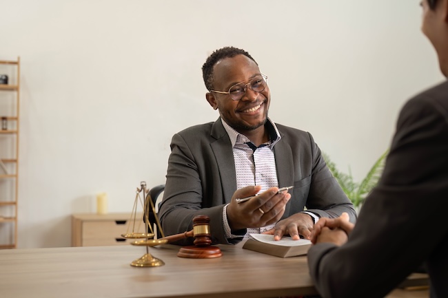 Byron Pugh Legal criminal defense attorney consulting with client about criminal charges in Nashville