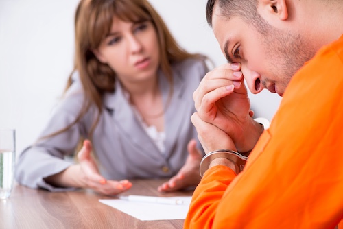 Client in Jumpsuit and Attorney - Sex Crime Allegations