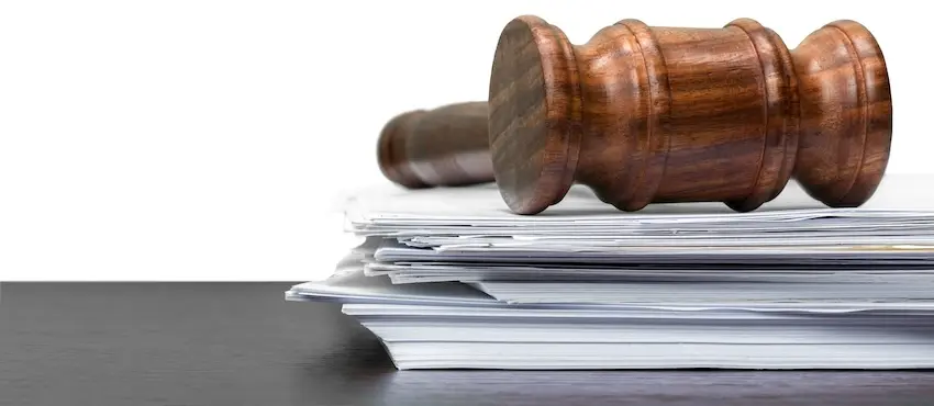 Gavel and legal documents representing Tennessee theft charge classifications from misdemeanor to felony handled by a criminal defense lawyer