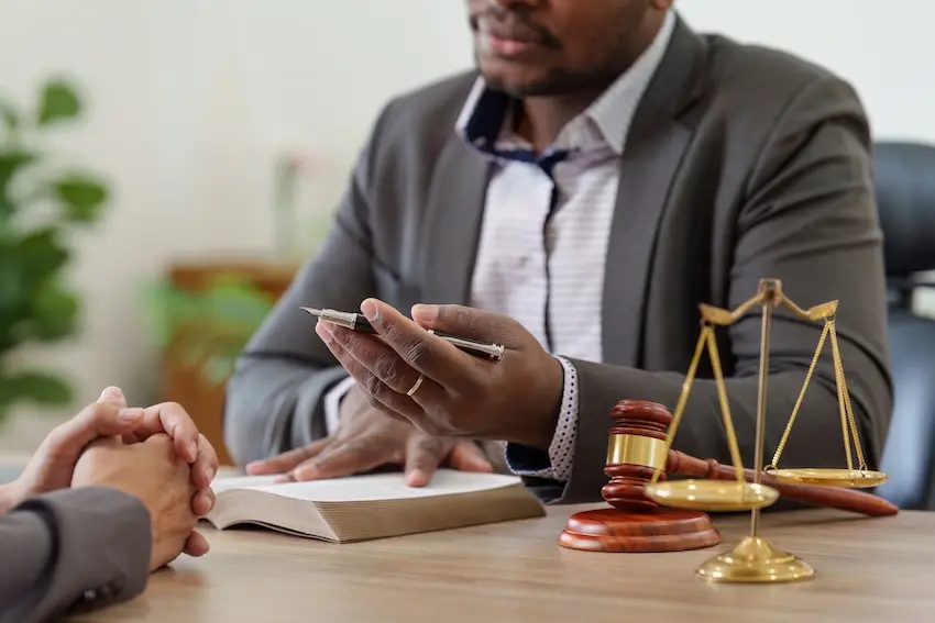 Person meeting with a criminal defense lawyer in Nashville Tennessee to discuss theft charges and legal defense options